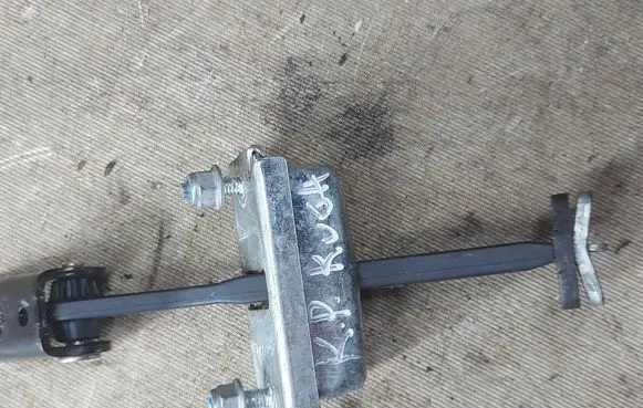 Ford Kuga I Rear door check strap stopper 5173991 W10007 R23500AJ