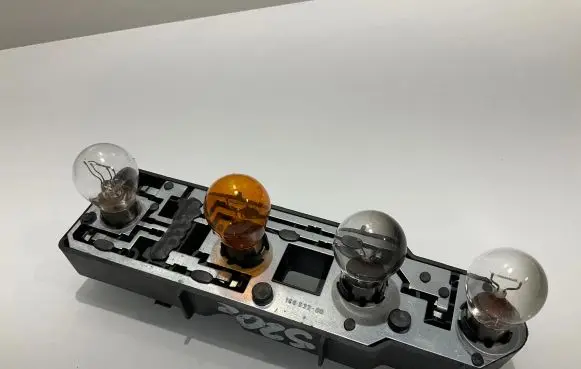 Mercedes-Benz C W202 Tail light bulb cover holder