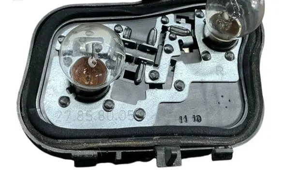 Mitsubishi Colt Tail light bulb cover holder 27852201