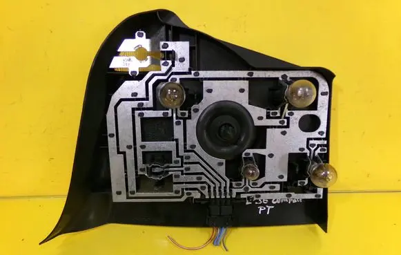 Tail light bulb cover holder