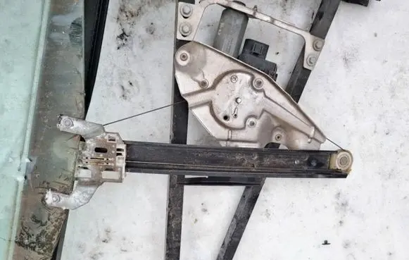 Sliding door window regulator with motor