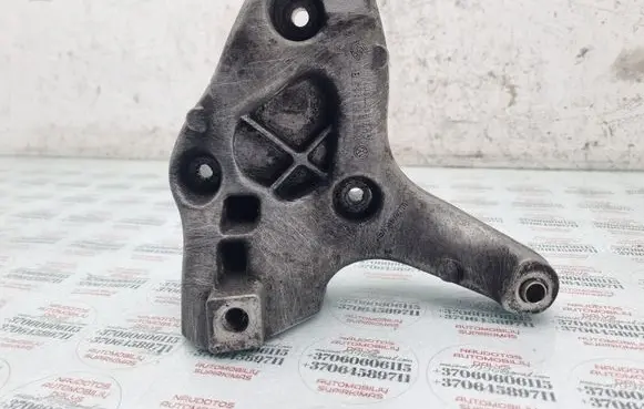 Volkswagen Golf V A/C compressor mount bracket 1K0260885B