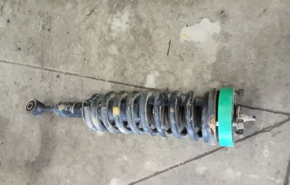 Toyota Hilux (AN10, AN20, AN30) Front shock absorber with coil spring 4851009K10