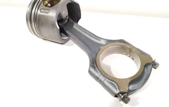 Piston with connecting rod