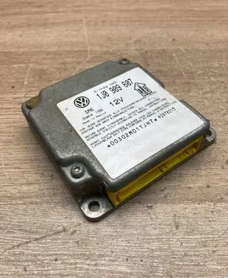 Volkswagen PASSAT B5 Airbag control unit/module 1J0909607 5WK4199