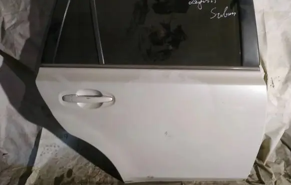 Subaru Legacy Rear door baltos