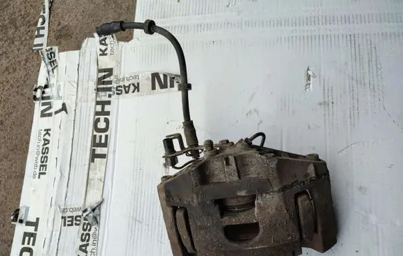 Audi A6 S6 C6 4F Front brake caliper 973