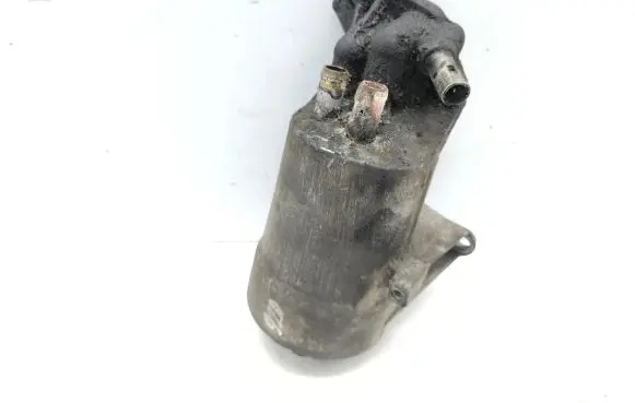 Oil filter mounting bracket