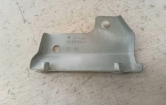 Volkswagen Caddy Fender mounting bracket 1T0810333A