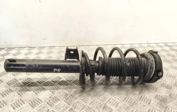Volkswagen Caddy Front shock absorber with coil spring 1K0413031BA 2K5412015Q