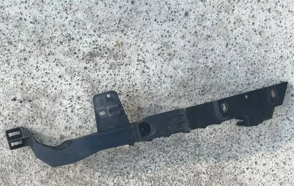 Opel Astra J Headlight/headlamp mounting bracket 13287639
