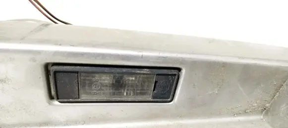Nissan Primera Number plate light 90810au400