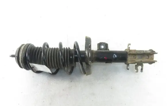 Opel Corsa D Front shock absorber with coil spring 
