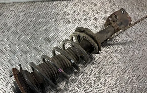 Front shock absorber with coil spring