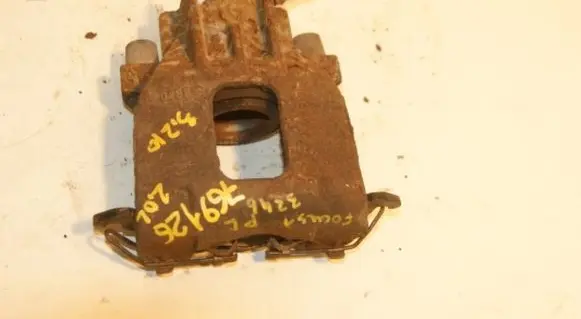Ford Focus Front brake caliper YS4Z2B121BA