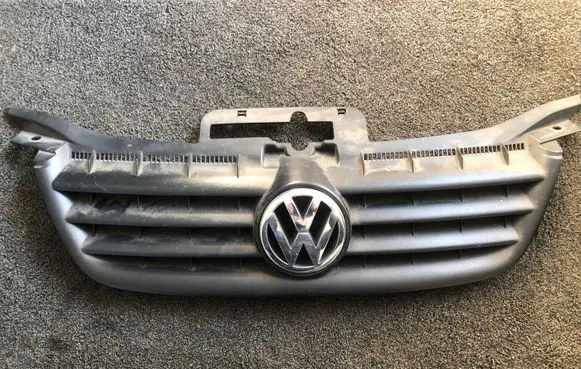 Volkswagen Touran I Front bumper upper radiator grill 1T0853651A