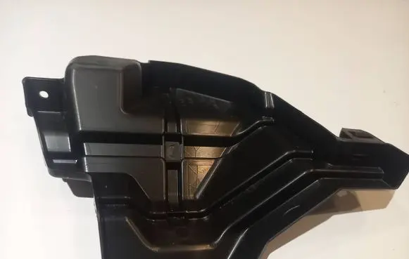 Engine bonnet/hood lock trim molding