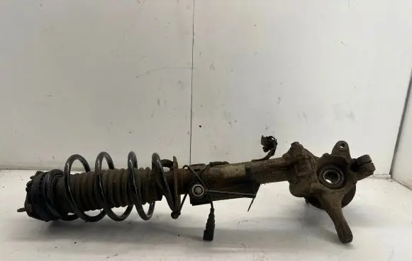 Front shock absorber with coil spring