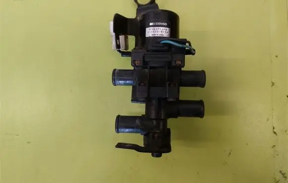 Coolant heater control valve