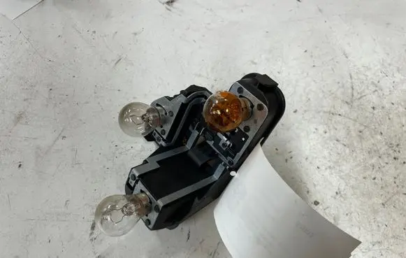 Volvo V40 Tail light bulb cover holder 31299833 21228009