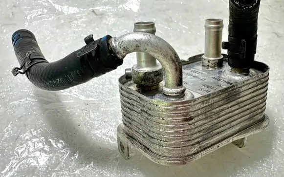 Volkswagen Touareg I Fuel cooler (radiator) 7L6203491D 48011 043210708