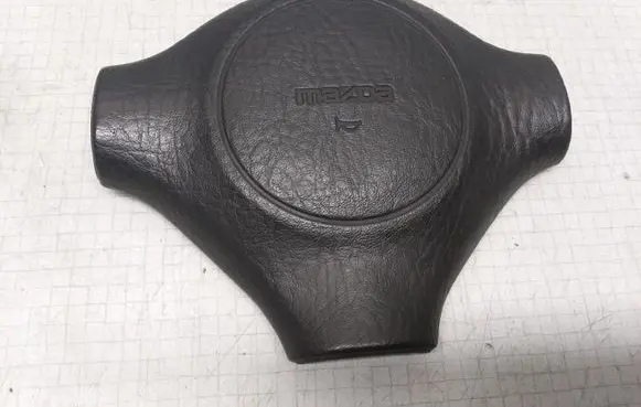 Mazda 323 F Steering wheel trim 