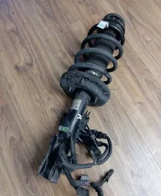 Cadillac SRX Front shock absorber with coil spring 20834664 2489000384