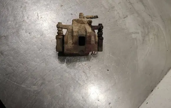 Suzuki Grand Vitara II Front brake caliper
