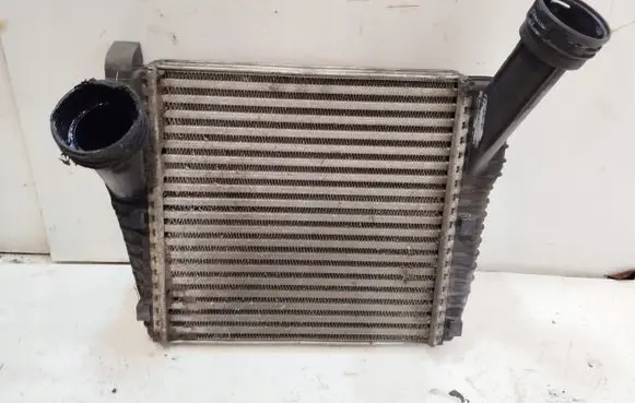 Volkswagen Touareg II Intercooler radiator 7L6145804A