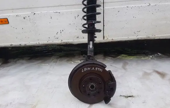 Seat Leon (1P) Front shock absorber with coil spring 1K0413031CG