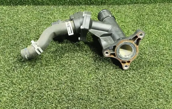 Thermostat/thermostat housing