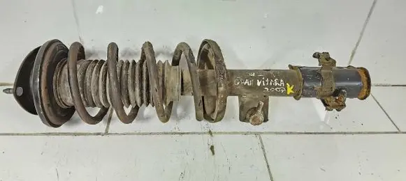 Suzuki Grand Vitara II Front shock absorber with coil spring
