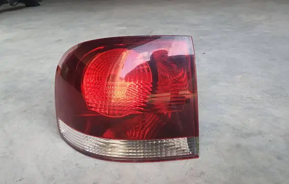 Volkswagen Touareg I Rear/tail lights 28259002 7L6945257