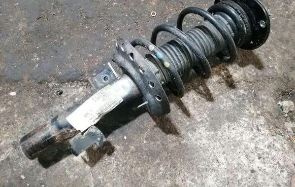Volvo S60 Front shock absorber with coil spring 31277200