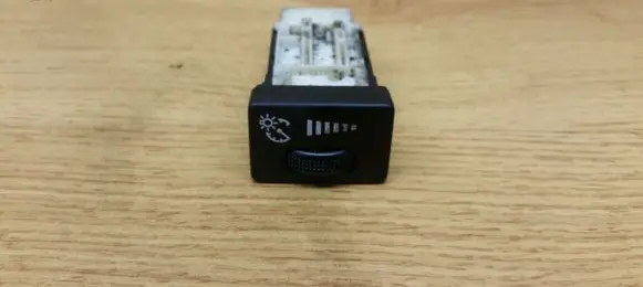 Panel lighting control switch