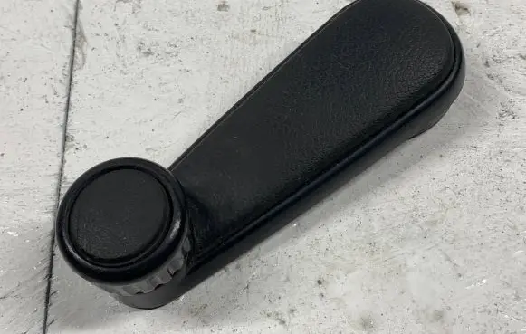 Volkswagen Golf II Front door window winding handle 191837579