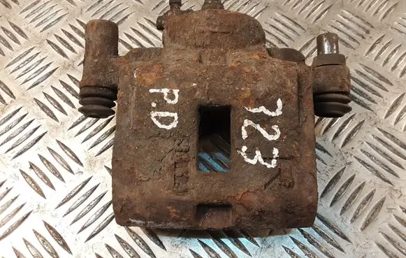Mazda 323 Front brake caliper
