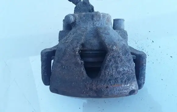 Volkswagen Golf IV Front brake caliper