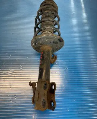 Toyota Yaris Front shock absorber with coil spring