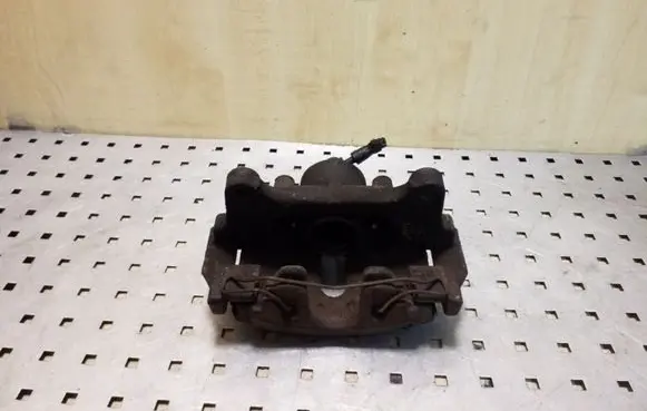Volkswagen PASSAT B7 Front brake caliper