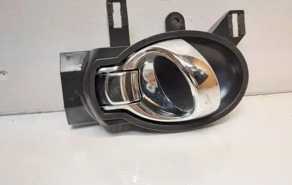 Nissan Juke I F15 Front door interior handle