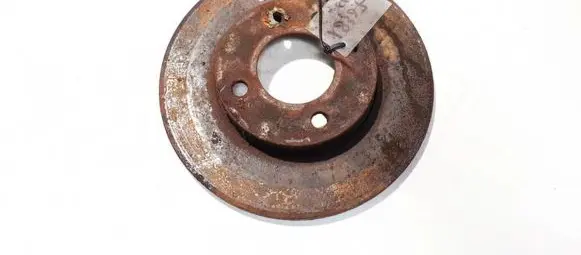 Volkswagen PASSAT B2 Front brake disc neventiliuojamas