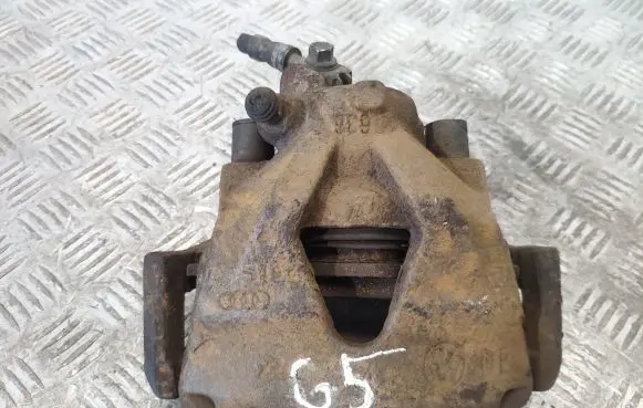 Volkswagen Golf V Front brake caliper