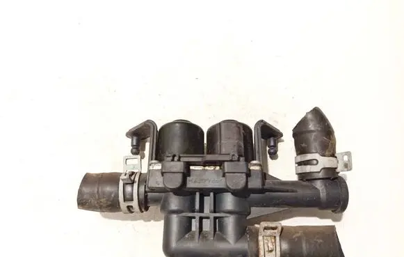 Coolant heater control valve