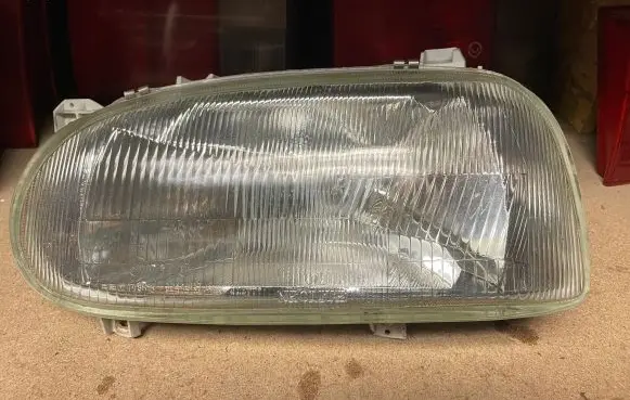 Volkswagen Golf III Headlight/headlamp 084411111L 084411111