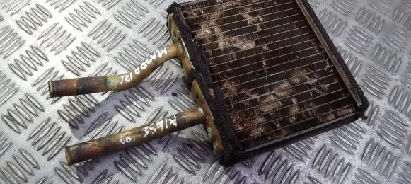Mazda 121 Heater blower radiator