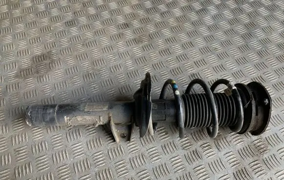 Front shock absorber with coil spring