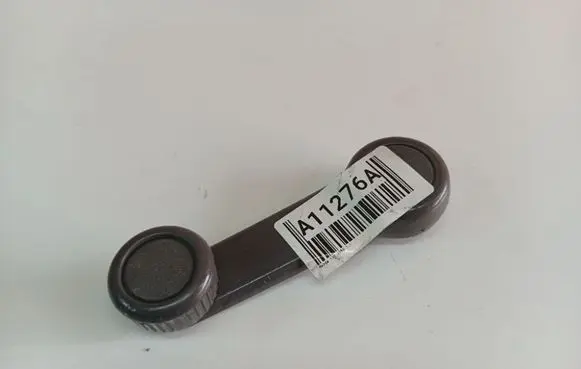 Mazda 121 Front door window winding handle