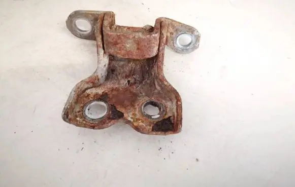 Front door check strap stopper