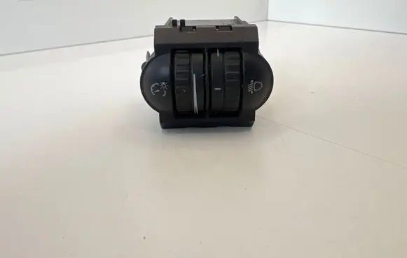 Headlight level height control switch